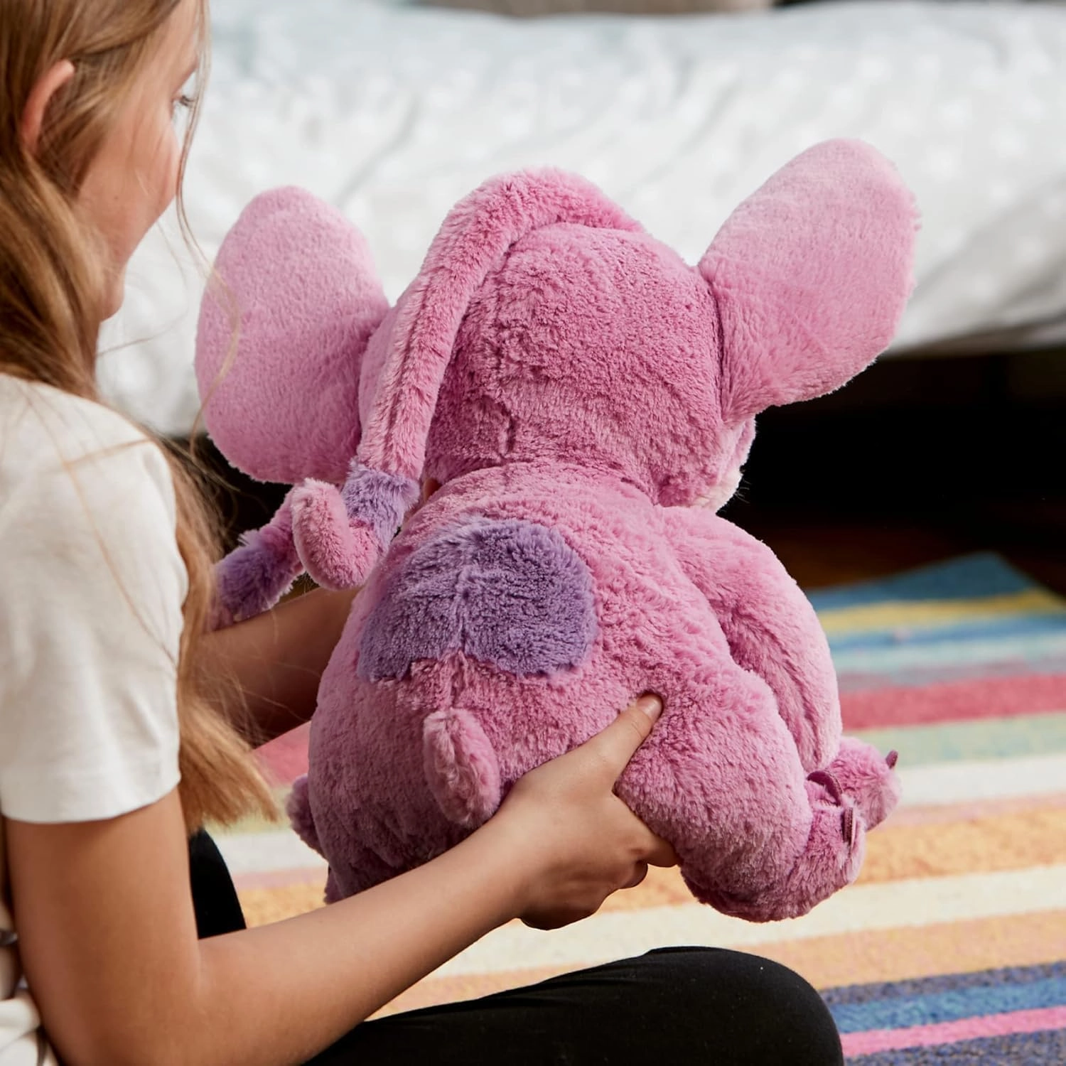 Disney Store Official Angel Medium Soft Toy for Kids, Cuddly Character with Fuzzy Texture and Embroidered Details, Flexible Floppy Ears, Disney Plushy Suitable for All Ages.